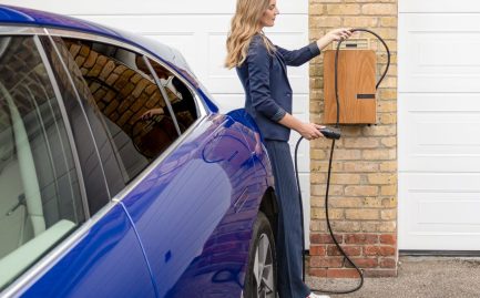 electric car charging at a Texas home powered by rooftop solar