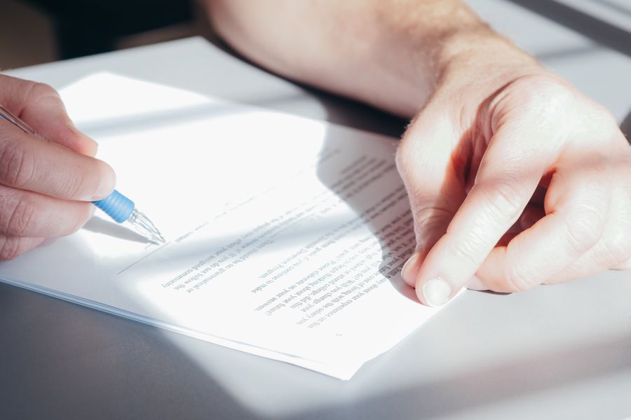 homeowner signing a solar contract without reading the terms